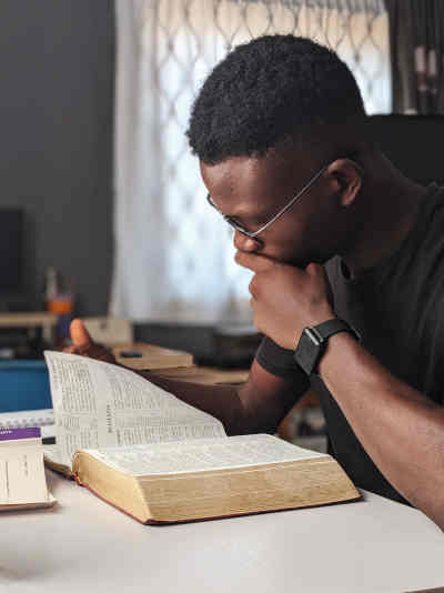 Man studying from a book